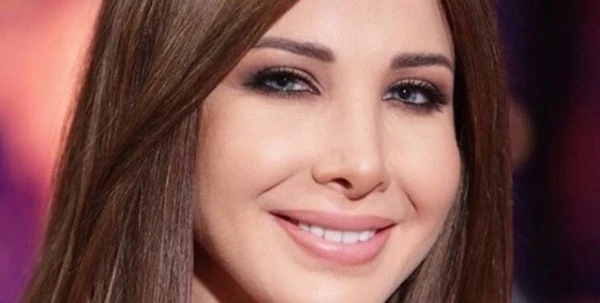 نانسي عجرم في إطلالة بعيدة عن البساطة في برنامج هيدا حكي