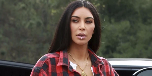 جنون Kim Kardashian يصل إلى بيرسينغ الأظافر