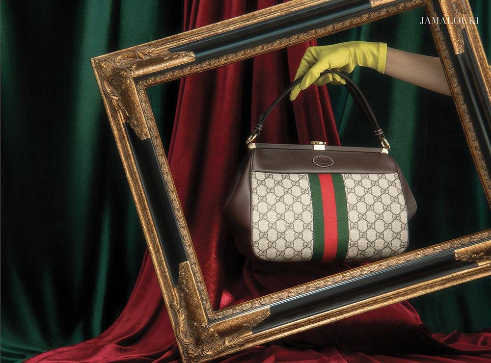 حقيبة بطبعة GG Supreme من GUCCI